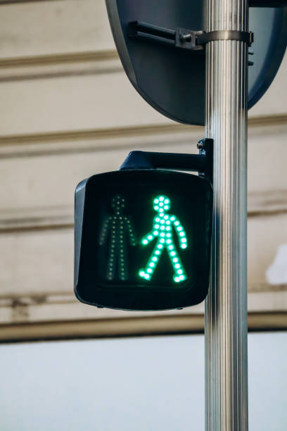 istock Green signal at a pedestrian traffic light 2157603192
