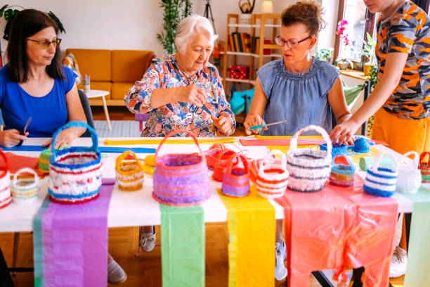 istock Family members have an interesting hobby of making decorative baskets using plastic bags 2157605833