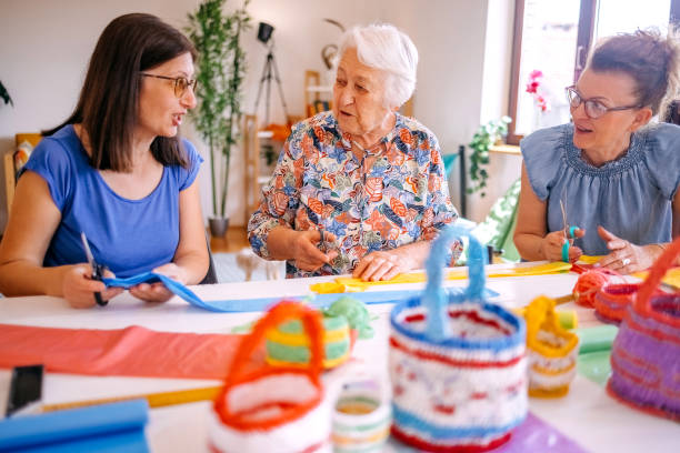 istock Family members have an interesting hobby of making decorative baskets using plastic bags 2157605835
