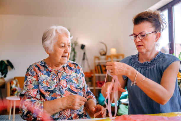 istock Family members have an interesting hobby of making decorative baskets using plastic bags 2157605905