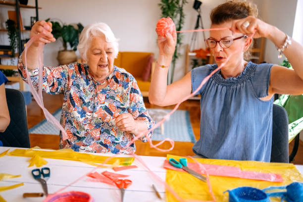 istock Family members have an interesting hobby of making decorative baskets using plastic bags 2157605963