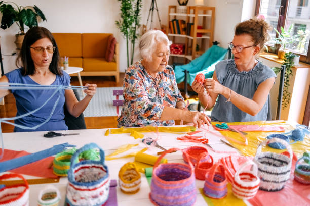 istock Family members have an interesting hobby of making decorative baskets using plastic bags 2157605965