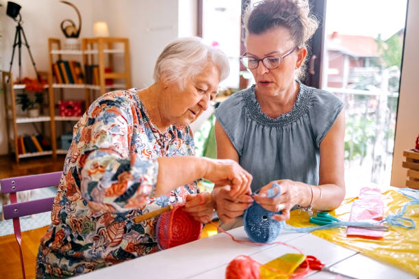 istock Family members have an interesting hobby of making decorative baskets using plastic bags 2157606046