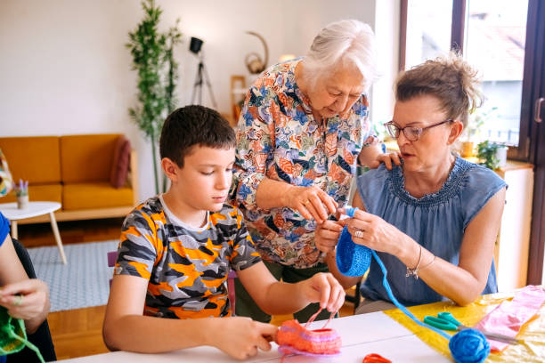 istock Family members have an interesting hobby of making decorative baskets using plastic bags 2157606749