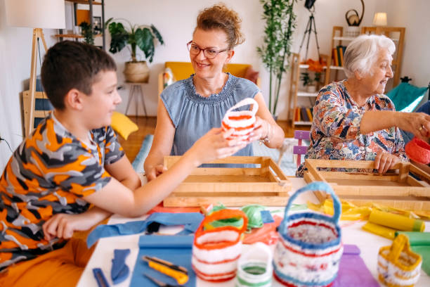 istock Family members have an interesting hobby of making decorative baskets using plastic bags 2157606797