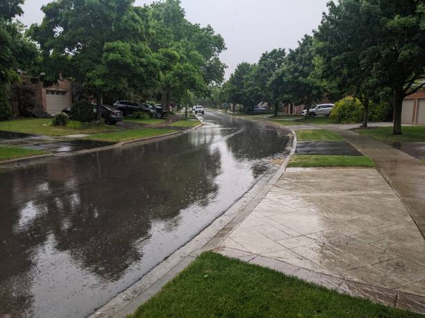 istock A Suburban Street on a rainy day 2157608398