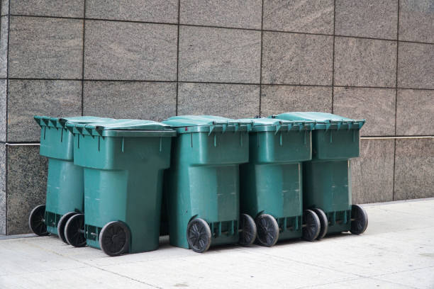 istock close up on trash containers outside office building 2157613901