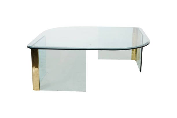 istock Asymmetrical Glass and Brass Cocktail Table on white background 2157622112