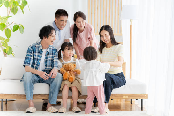 istock Three generation family relaxing in the living room 2157630653