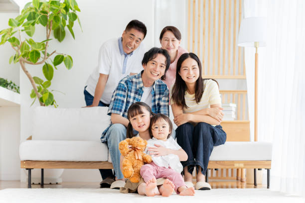 istock Three generation family relaxing in the living room 2157630662