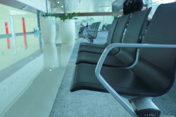 Empty chairs in the departure hall at airport