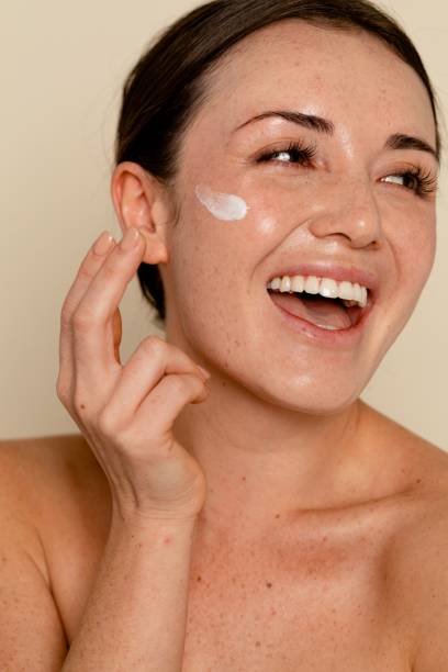 istock Moisturizing face cream on skin 2157634292
