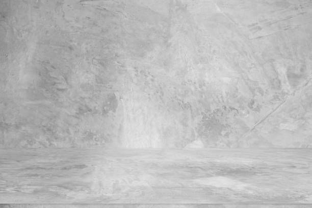 istock Wall empty studio interior background and backdrop of concrete cement wall in black and gray tones. Studio interior background and empty space Decorating ideas 2157635262