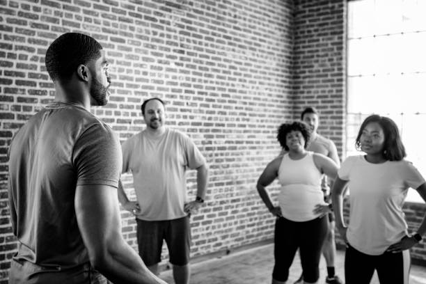 Trainer with his group fitness class