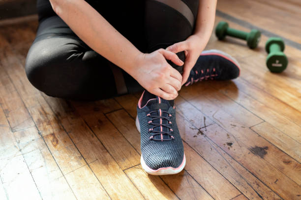 istock Woman with a sprained ankle 2157637555