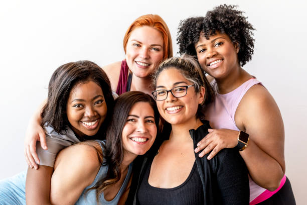 Happy female workout team at the gym