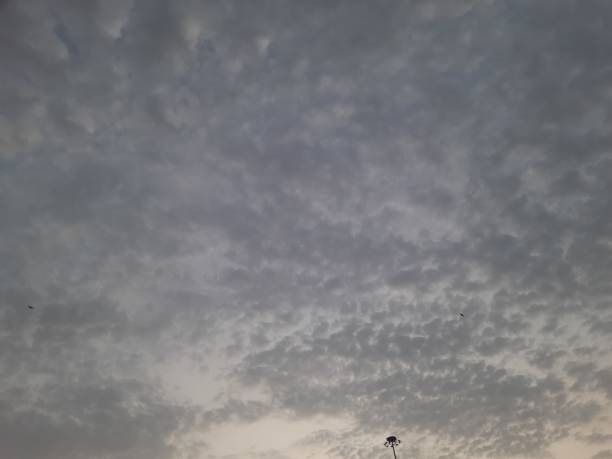 White and gray clouds in the sky after sunset