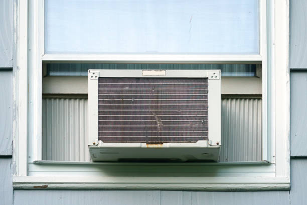 istock old air conditioner installed on house window 2157643973