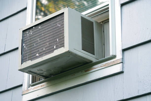 istock old air conditioner installed on house window 2157645930