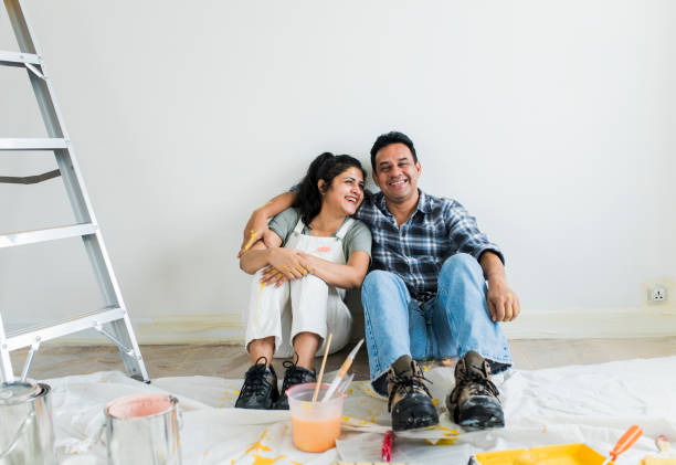 istock Couple resting after painting the room 2157651561