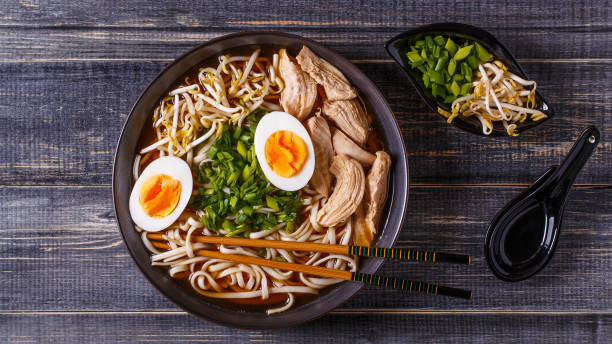 istock Japanese ramen soup with chicken, egg, chives and sprout. 2157654319