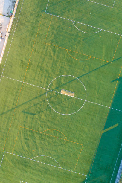 istock artificial grass soccer field seen from a drone, zenithal view 2157658183