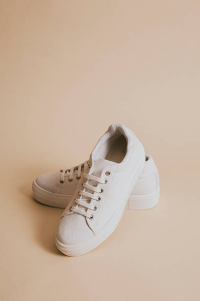 istock White canvas sneaker woman's shoes 2157659275
