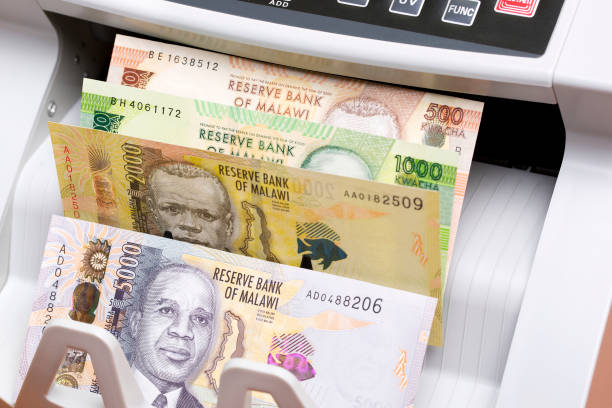 istock Malawian kwacha in a counting machine 2157659449