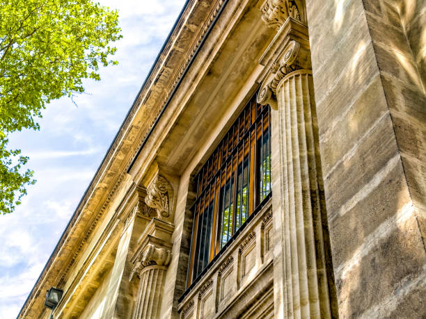 Low angle view of old public building exterior in Karakoy, Istanbul, Turkey