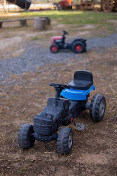 istock miniature tractor on eco farm 2157663812