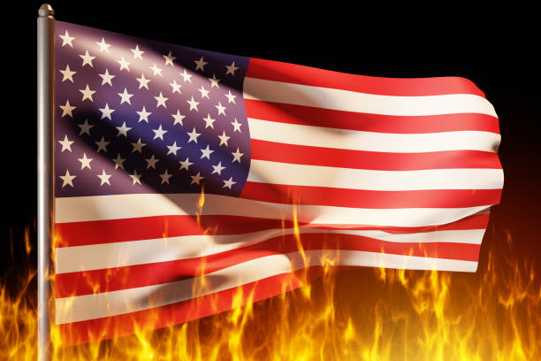 istock US flag. Flame under banner America. Burning US political symbol. Flame under developing flag. Concept political and economic crisis in US. Metaphor for problems in United States of America. 3d image 2157666705