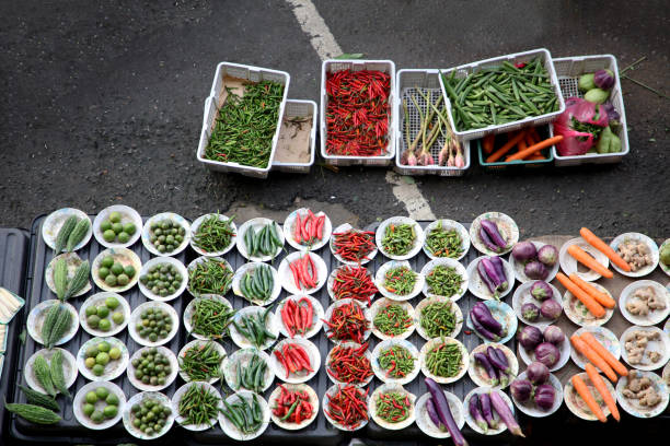 A selection of vegetables, fruits and vegetables at the market in the centre of the capital Bandar Seri Begawan in the kingdom of Brunei Darussalam on Borneo in South East Asia.