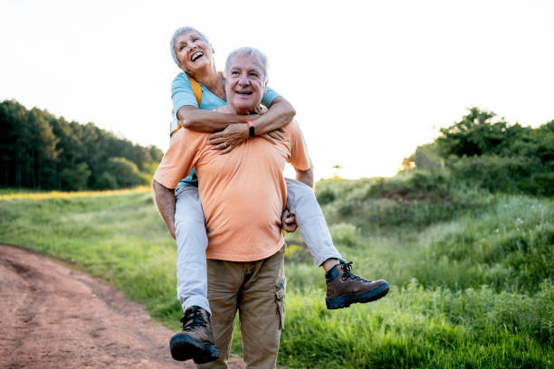 istock Playful senior couple having fun in nature 2157668298