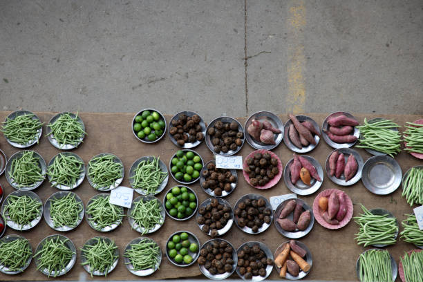 Point of View: Retail market displaying vegetables