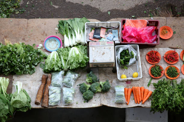 Point of View: Retail market displaying vegetables