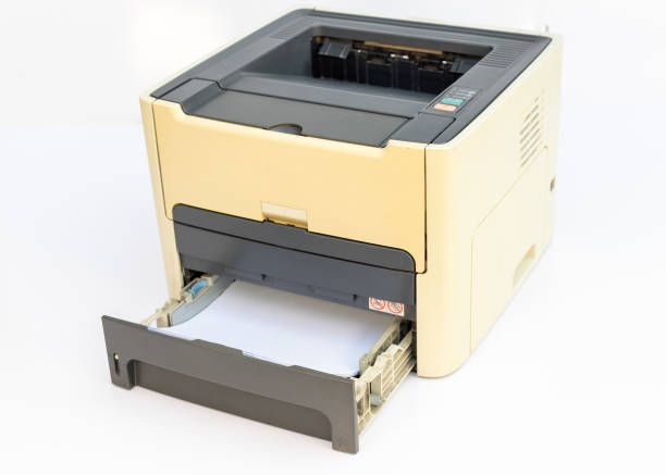istock Laser printer paper with open empty paper tray isolated on a white background 2157669487