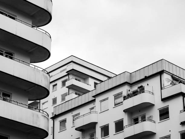 Low angle view of buildings in black and white