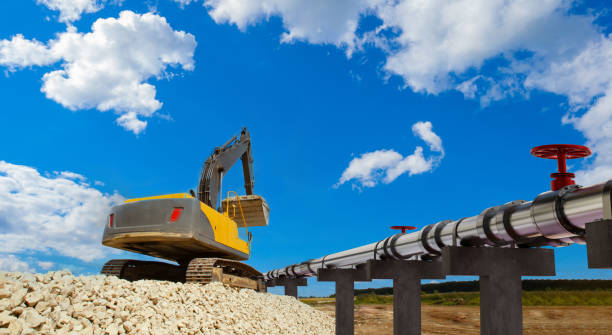 Tractor near gas pipes. Pipeline construction. Construction pipeline for gas export. Construction site with oil pipes. Gas pipes under blue sky. Pipes For supply fuel. Commissioning tubing. 3d image tractor cerca de tuberías de gas. construcción de tuberías. construcción de gasoducto para exportación de gas. sitio de construcción con tuberías de aceite. tuberías de gas bajo el cielo azul. tuberías para suministro de combustible. tubería de p