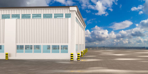 istock Production room. Panoramic visualization of production building. Industrial Design Three-dimensional. Production room view from street. Industrial hangar with blue sky. 3d rendering. 2157671531