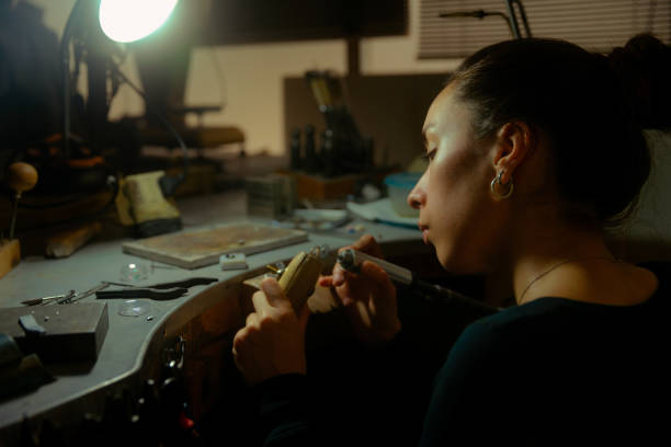 istock Woman jeweller working in studio workshop 2157677643