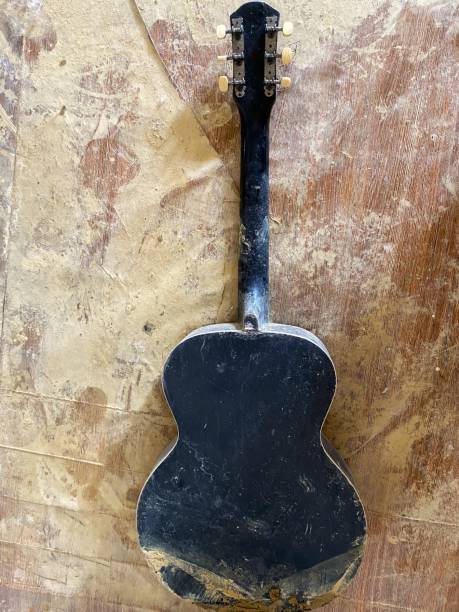 istock a guitar that has been damaged and dirty 2157679719