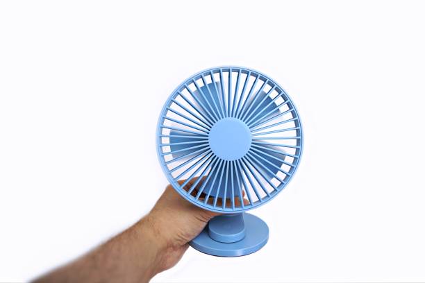 istock A fan in the man's hand on a very hot day 2157680473