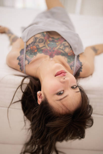 istock Thai woman relaxing on bed 2157681931