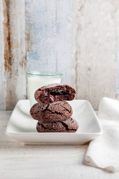 istock Cookie filled with chocolate cream. Chocolate cookies and milk. Biscuits filled with chocolate cream. Chocolate cream cookies. Dark Chocolate Cookies and milk. Cookies souffle. 2157682300