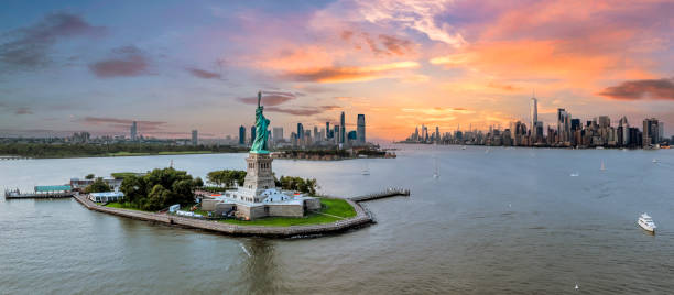 istock Statue of Liberty Manhattan sunset view 2157682624