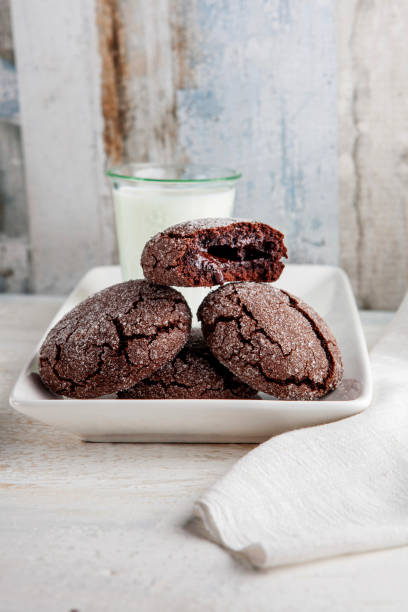 istock Cookie filled with chocolate cream. Chocolate cookies and milk. Biscuits filled with chocolate cream. Chocolate cream cookies. Dark Chocolate Cookies and milk. Cookies souffle. 2157682636