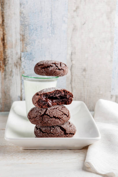 istock Cookie filled with chocolate cream. Chocolate cookies and milk. Biscuits filled with chocolate cream. Chocolate cream cookies. Dark Chocolate Cookies and milk. Cookies souffle. 2157682894
