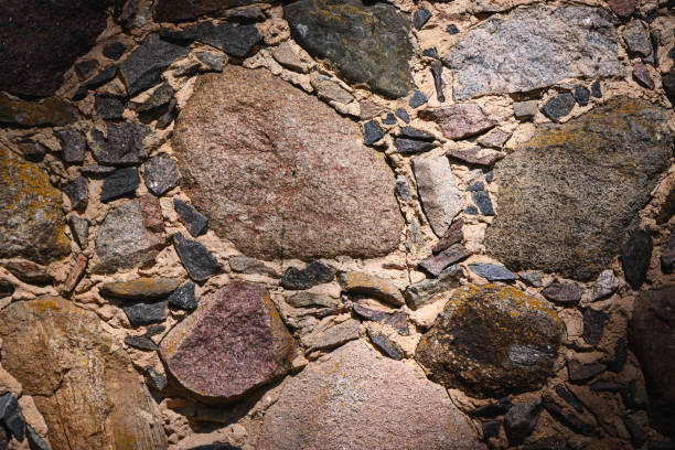 beautiful wall texture background with decorative stone and dark stones on the right side