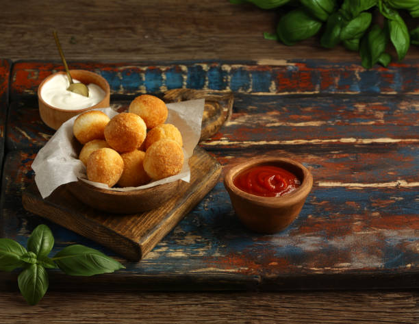 istock traditional Italian arancini with cheese and basil 2157693959
