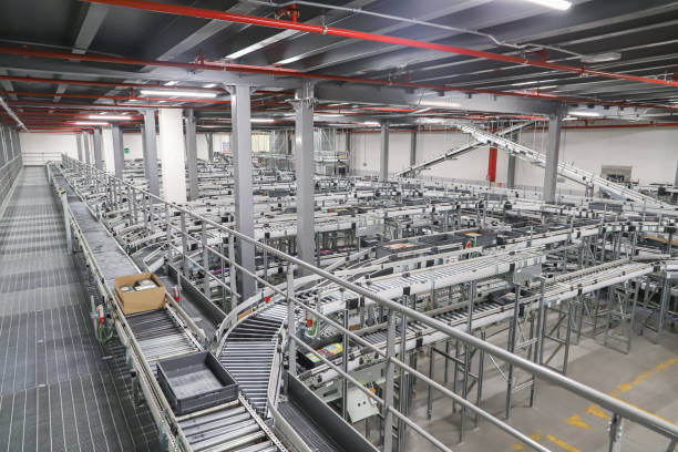 istock conveyor belt in a modern logistic warehouse 2157696805